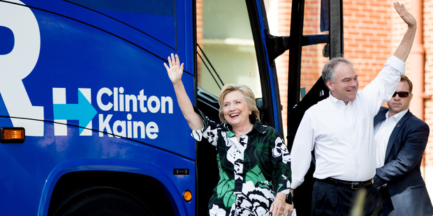 Hillary Clinton and running mate Tim Kaine arrive in Columbus, Ohio on their bus trip. Photo / AP