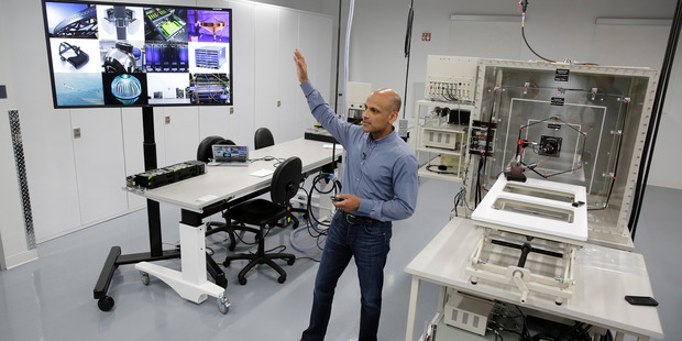 Jay Parikh, vice president of engineering, talks about Area 404, the hardware R&D lab, during a tour at Facebook headquarters in Menlo Park, California. Photo / AP