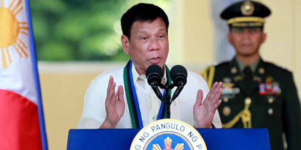 Philippine President Rodrigo Duterte addresses the troops during a military ceremony. Photo / AP