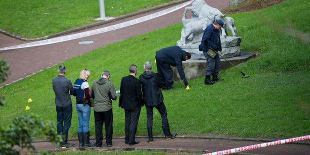 Police examining the scene of David Cerven's death in Myers Park. Photo / Jason Oxenham.