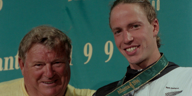Duncan Laing with gold medal winning swimmer Danyon Loader (right) at the 1996 Olympic Games in Atlanta. Photo / NZ Herald