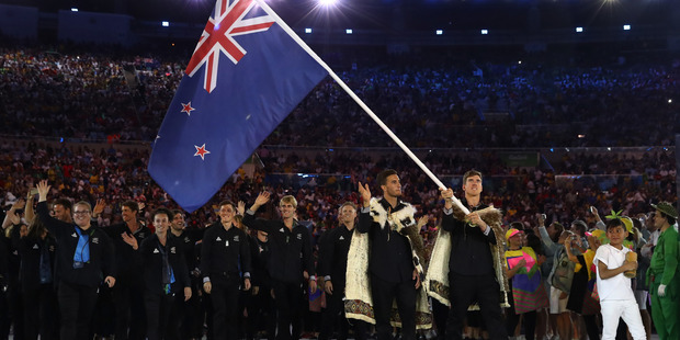 Peter Burling carries the flag during the Opening Ceremony of the Rio 2016 Olympic Games. Photo / Getty Images