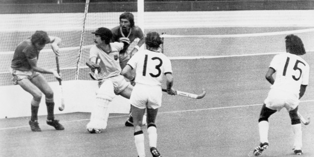 New Zealand striker Ramesh Patel (No15) sees his shot knocked over the bar by Australian goalie Robert Proctor in the gold medal hockey match at the 1976 Montreal Olympics. Photo / AAP