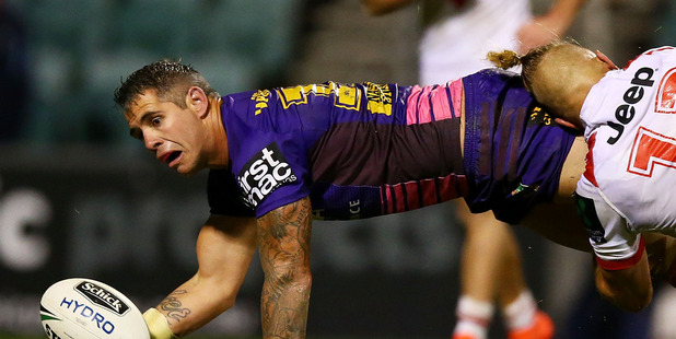 Corey Parker of the Broncos offloads during the round 22 NRL match between the St George Illawarra Dragons and the Brisbane Broncos. Photo /Getty