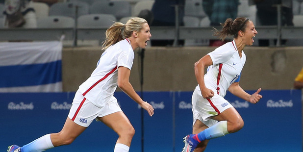 United States' Carli Lloyd, right, celebrates after scoring against New Zealand at the Rio Olympics. photo / AP