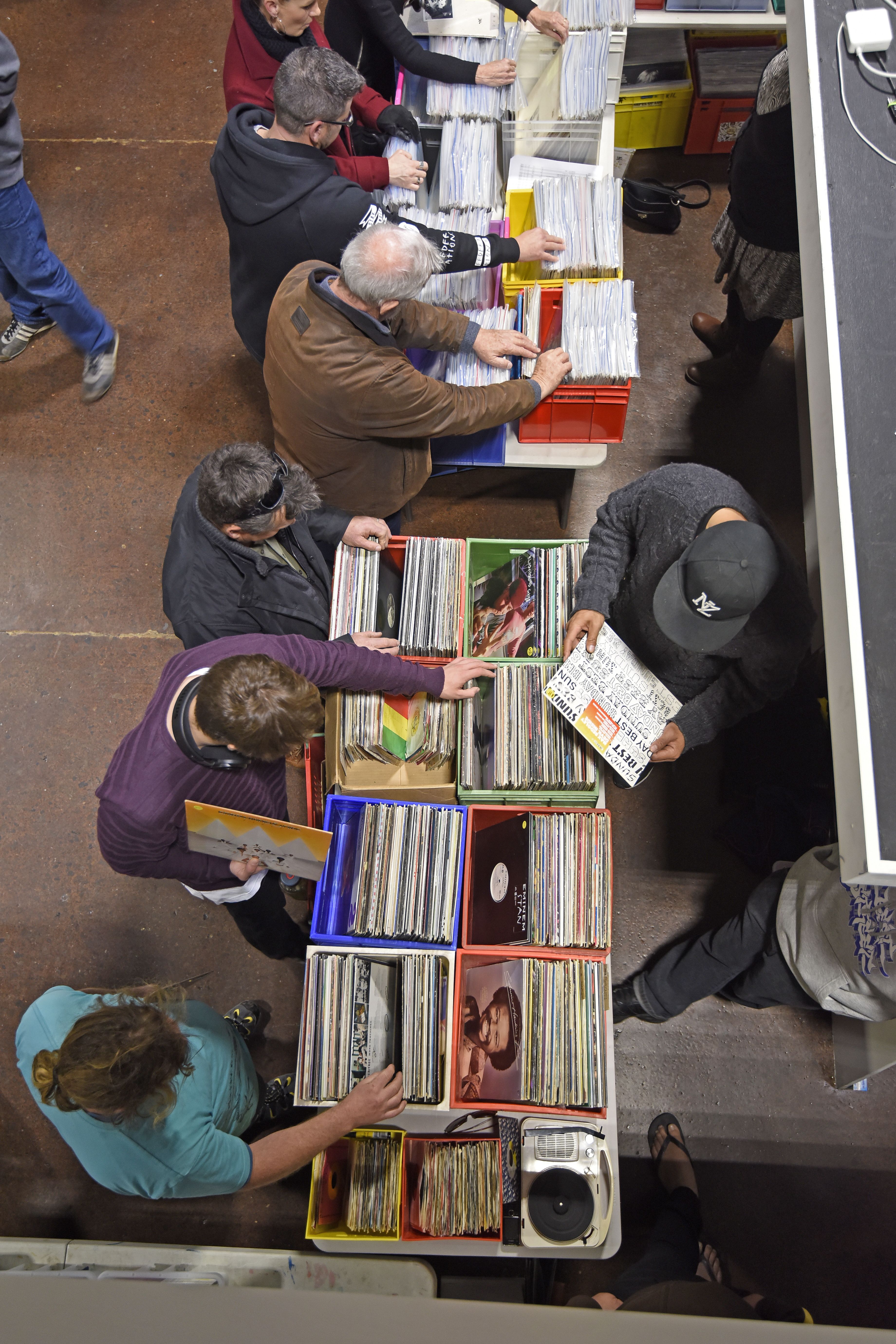 Collectors scour boxes of records. Photo/George Novak