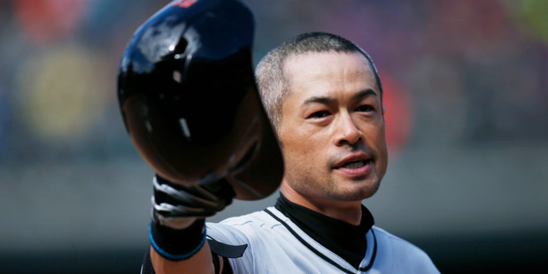 Miami Marlins' Ichiro Suzuki tips his batting helmet to the crowd after his 3,000th career hit. Photo / AP