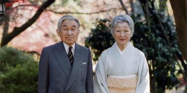 Emperor Akihito and Empress Michiko stand together by Sokintei arbor. Photo / Getty