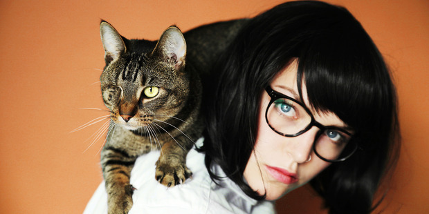 Cat people tend to be single and express a "wider range of emotions" (including, chiefly, exhaustion and annoyance). Photo / Getty