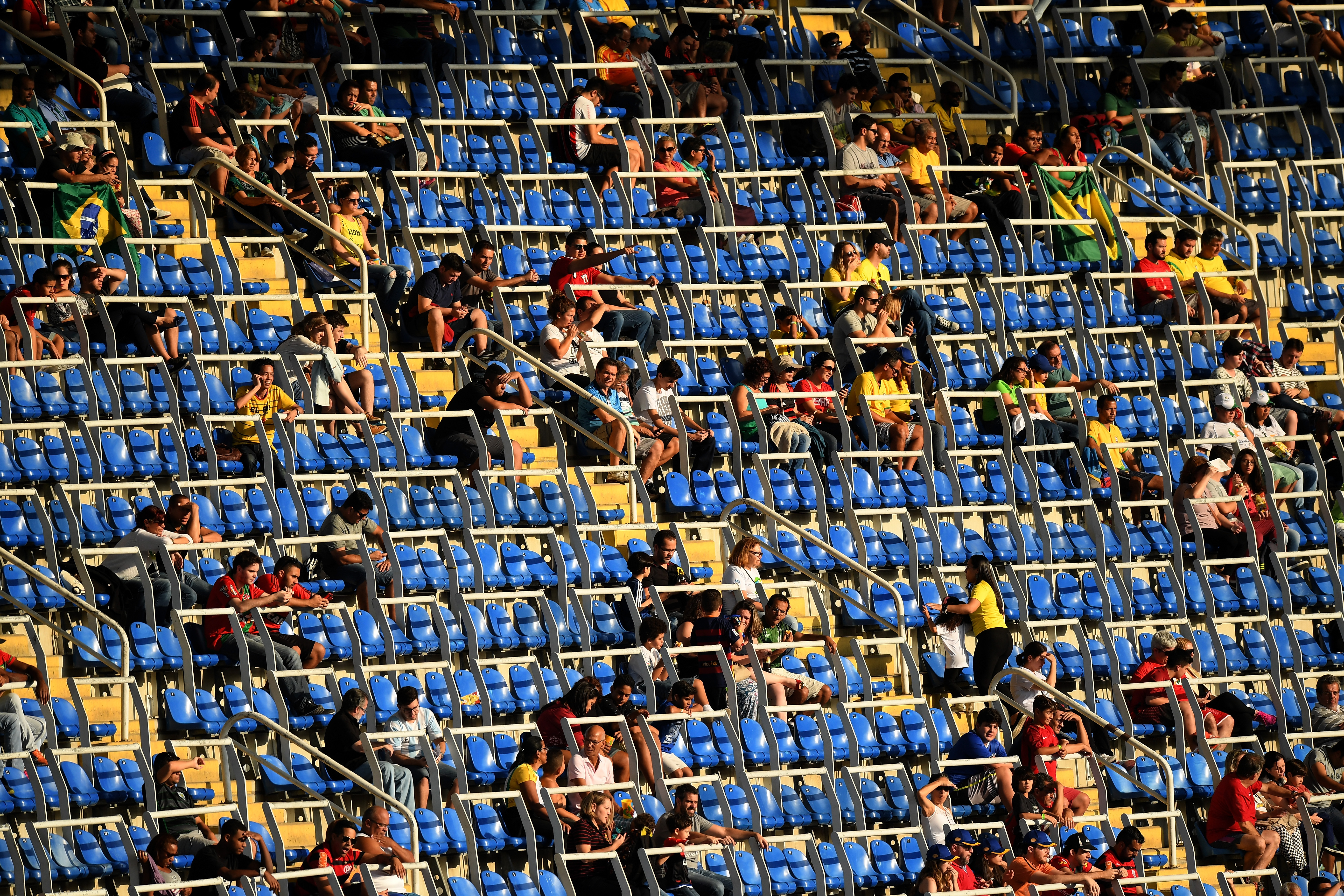 Empty seats plague a men's football match. Photo / Getty