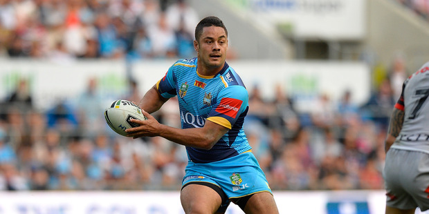 Jarryd Hayne of the Titans looks to pass against the Warriors. Photo / Getty Images