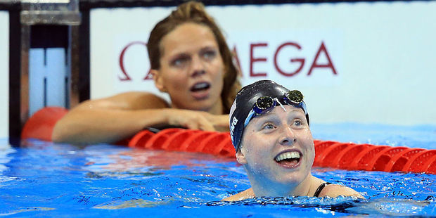 Lilly King celebrates winning gold as rival Yulia Efimova settles for silver. Photo / Getty