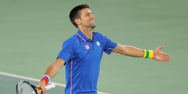 Novak Djokovic, of Serbia, gestures after winning a point against Juan Martin del Potro. Photo / Getty Images