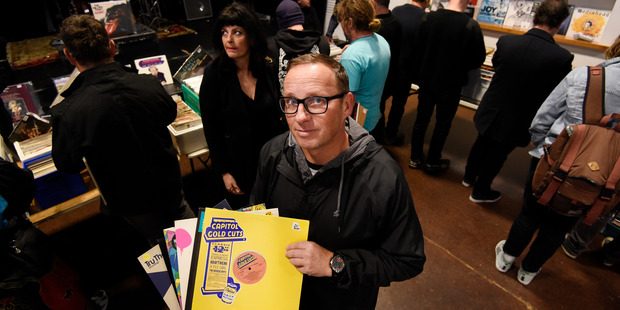 Shaun O'Brien shows off his best buy - a Kraftwerk record. Photo/George Novak