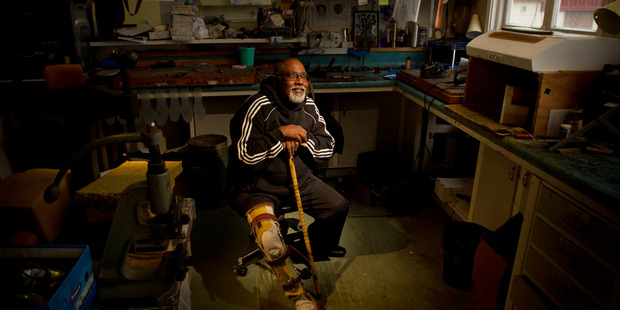 LOOKING FORWARD: QE helps Fijian polio victim Reggie Kumar who is looking forward to his new leg. PHOTO/STEPHEN PARKER