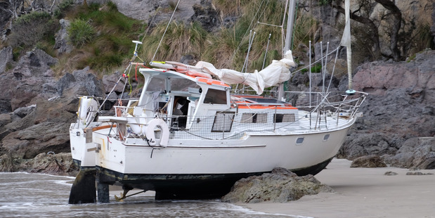 Windsong washed ashore on Waihi beach the day after it was abandoned at sea. Photo/Melanie Camoin