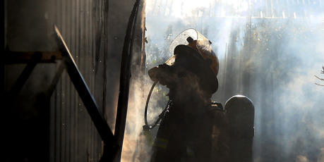 Whanganui fire fighters were called to a house fire near the intersection of Ingestre St and Harrison St on Thursday afternoon. Photo/ Stuart Munro