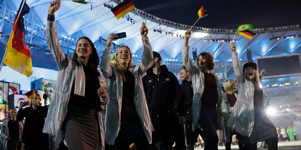Angelique Kerber of Germany, second left, arrives with the Germany team during the opening ceremony. Photo / AP