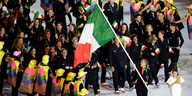 Federica Pellegrini carries the flag of Italy. Photo / AP