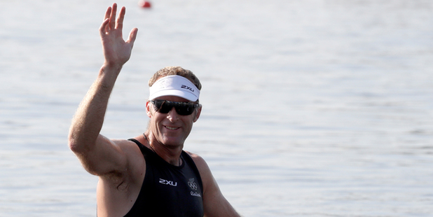 Mahe Drysdale, of New Zealand, waves after competing in the men's single scull heat during the 2016 Summer Olympics in Rio de Janeiro, Brazil. AP Photo/Andre Penner