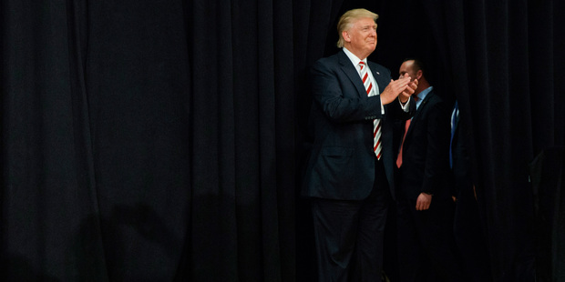 Donald Trump arrives for a campaign rally at Windham High School. Photo / AP