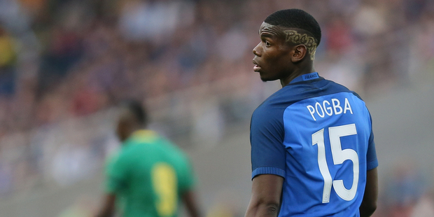 France's Paul Pogba is the most expensive man in world football after signing with Manchester United for 100 million pounds. Photo / AP