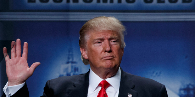 Republican presidential candidate Donald Trump waves after delivering an economic policy speech. Photo / AP
