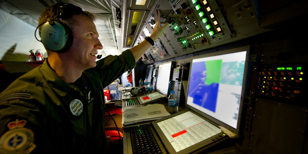 Royal Air Force Weapons Systems Officer, Flight Lieutenant Eric Kingduring the search mission of the Southern Indian Ocean for Malaysia Airlines MH370. Photo / AP