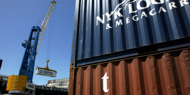 Containers being loaded at the Port of Napier. Exporters are hoping for a fall in the exchange rate. Photo / NZME.
