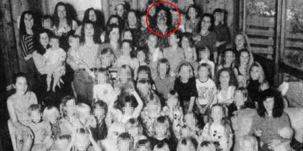 The cult leader, circled, was also convicted of throwing a plank of wood at the head of one of the children. Photo / AP