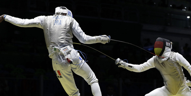 Peter Joppich of Germany competes with of Enzo Lefort France in the men's individual foil fencing event. photo / AP