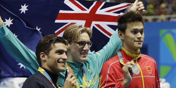Australia's Mack Horton, middle, called out China's Sun Yang, right, as a drugs cheat. Photo / AP