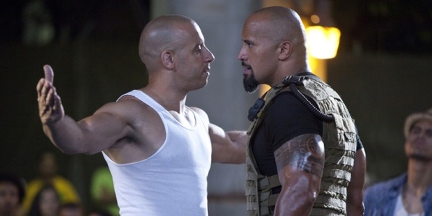 The Rock says "with any team that's a family, there's gonna be conflict".