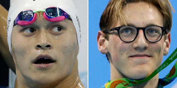 Sun Yang, left, and Mack Horton are rivals on and off the water. Photos / AP