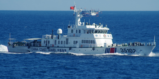 In this photo released by the 11th Regional Coast Guard Headquarters of Japan, a Chinese coast guard vessel sails near disputed islands this month. Photo / AP