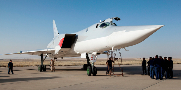 In this photo taken yesterday, a Russian Tu-22M3 bomber stands on the tarmac at an air base near Hamedan, Iran. Photo / AP