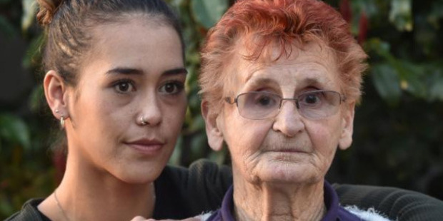 South Dunedin resident June Spooner, with granddaughter Shaquille Spooner-Nixon, wants police to bring her attacker to justice. Photo / Peter McIntosh.