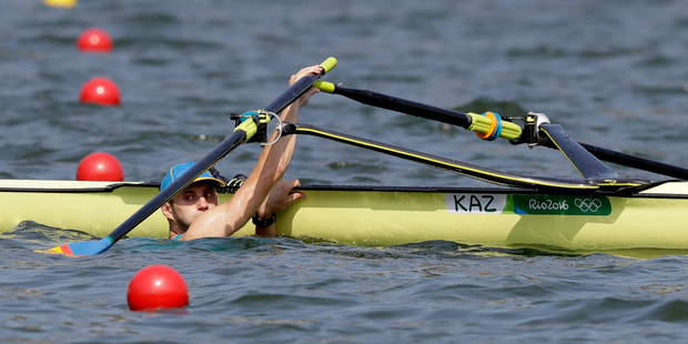 Vladislav Yakovlev, of Kazakhstan, was one of the victims of rough conditions at the Rodrigo de Freitas Lagoon during the rowing regatta at the Rio Olympics. Photo / AP