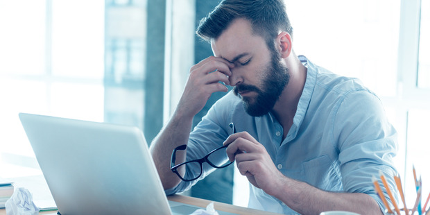 When men were the sole breadwinner in their family, their psychological well-being scores were an average of 5 per cent lower than when their partners contributed equally. Photo / Getty