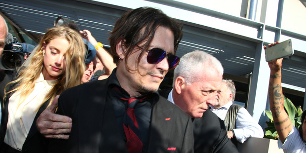 Johnny Depp and Amber Heard pictured on arrival to Southport Magistrates Court on April 18, 2016 in Southport, Queensland.