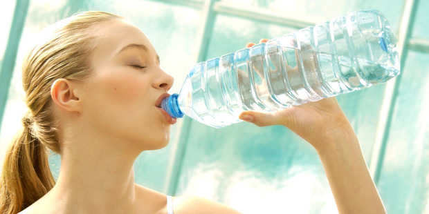 Although dry skin is a symptom of dehydration, once you are well hydrated, drinking more water will not make your skin dewier. Photo / Getty