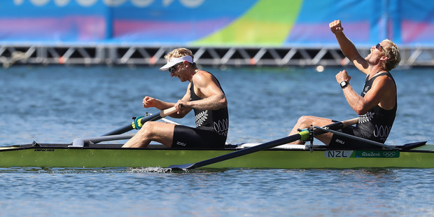 Eric Murray and Hamish Bond celebrate winning the gold medal in the Men's Pair Final. Photo / Getty Images