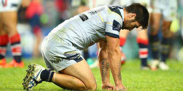 Cowboys prop James Tamou reacts after his went down to the Roosters on Sunday night. Photo / Getty Images