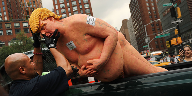 Union Square Park authorities hauled away the statue of presidential candidate Donald Trump. Photo / Getty Images