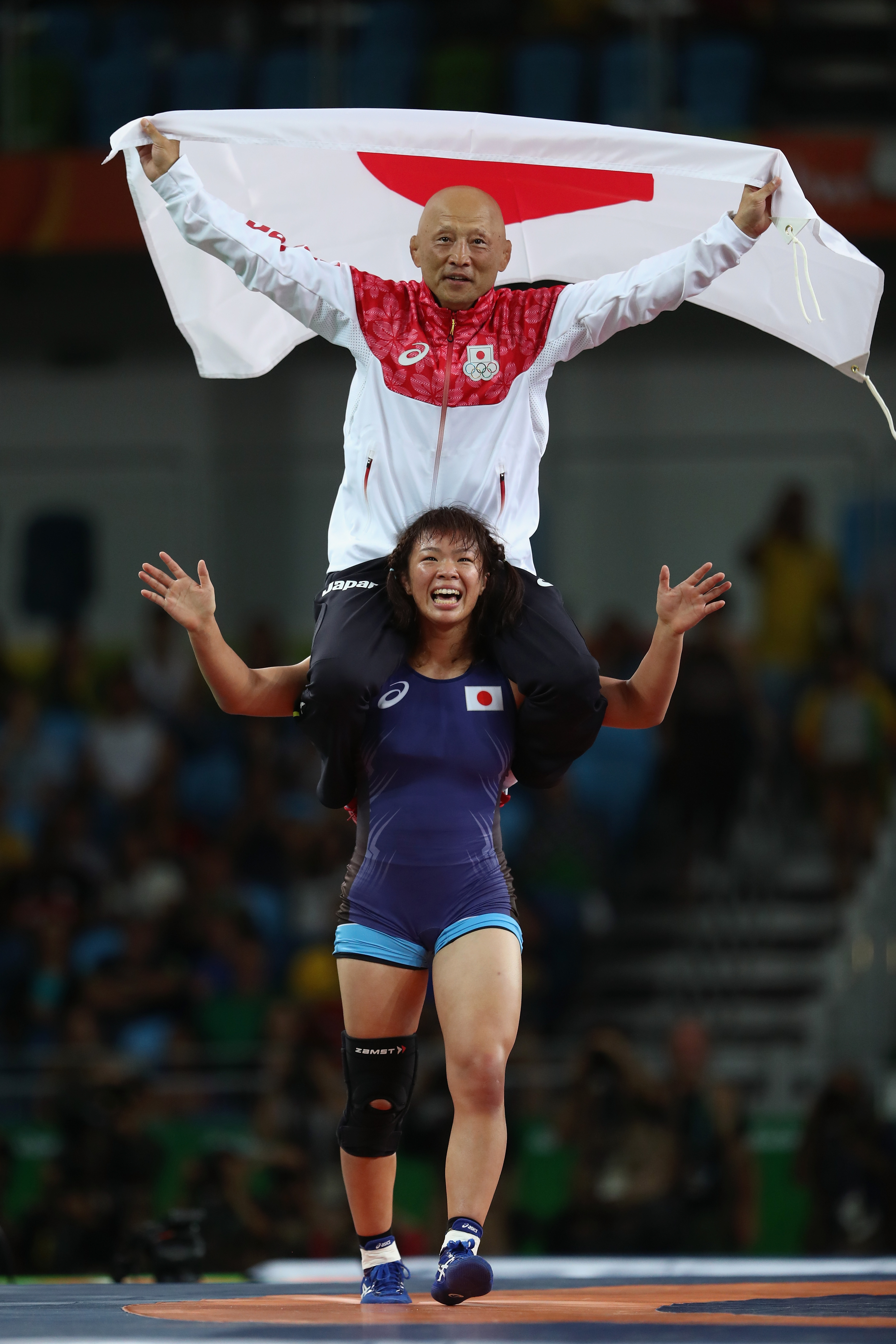 Risako Kawai, who claimed Japan's fourth gold medal in women's wrestling in Rio, delighted the crowd with her eccentric celebration. Photo / Getty Images
