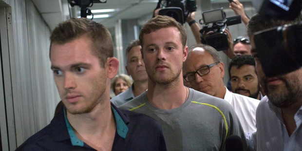 US Olympic swimmers Gunnar Bentz, left, and Jack Conger after being questioned by police in Rio de Janeiro. Photo / AP