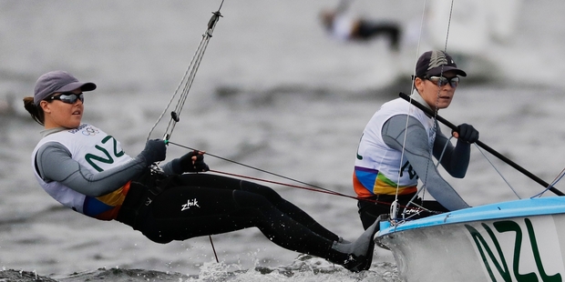 New Zealand's Polly Powrie, left, and Jo Aleh compete during the 470 women race at the 2016 Summer Olympics. Photo / AP