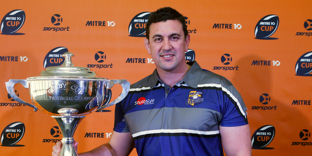 WELL DESERVED: BOP coach Clayton McMillan, with the Rugby Cup won by Bay of Plenty in 1976, has extended his contract until end of 2019 season. Photo/photosport