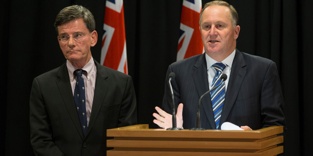 The Attorney General, Chris Finlayson, left, and Prime Minister John Key announcing changes to intelligence agency rules during a press conference. Photo / Mark Mitchell