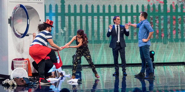 Contestants hypnotised to do their washing in new televisions series You're Back in the Room.